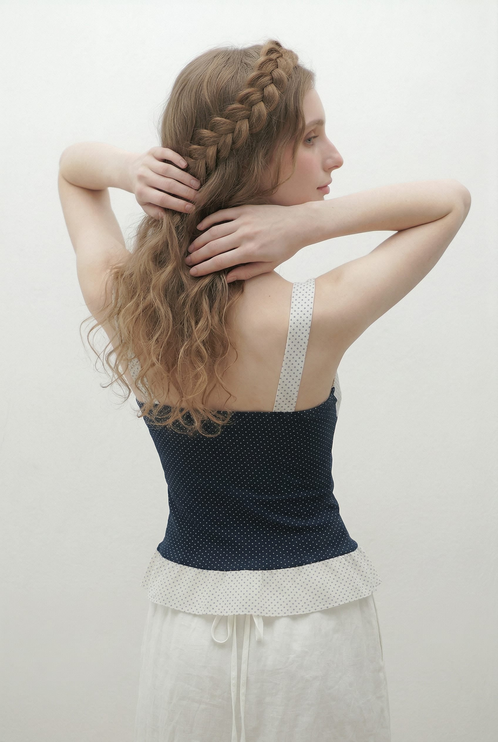 Navy Dotted Peplum Contrast Tank